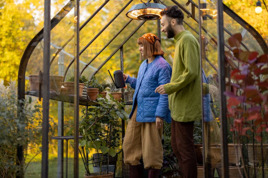 tending-plants-together-in-greenhouse-with